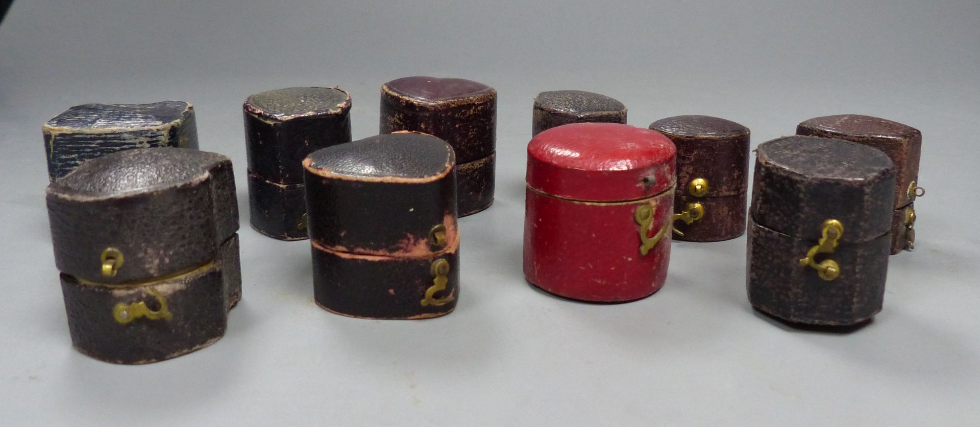 Ten assorted antique ring boxes.